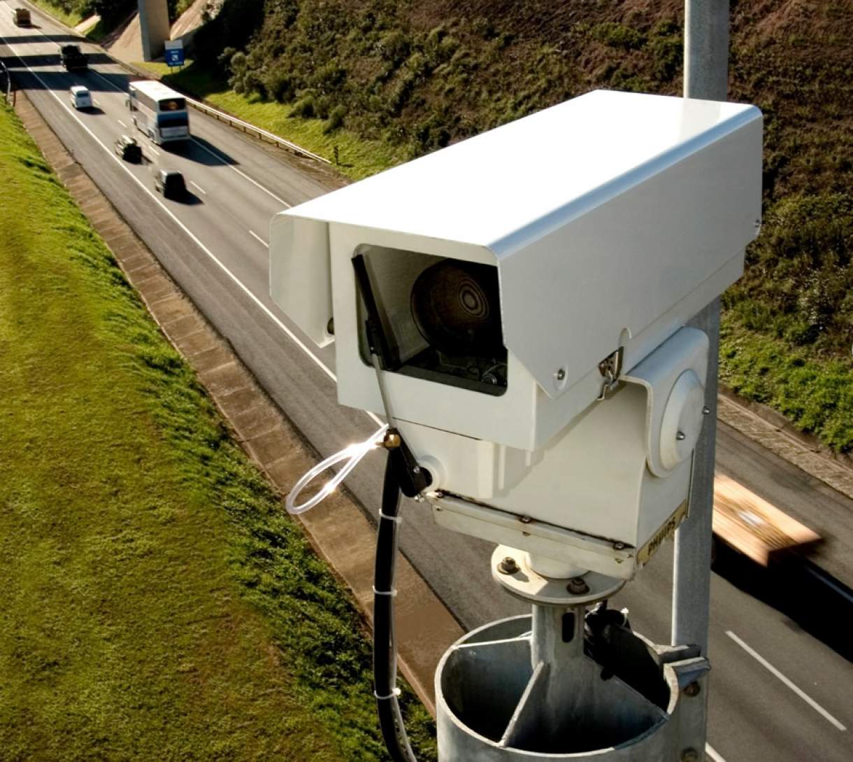 Will more than 65 vehicles pass on the highway in the next 5 minutes?